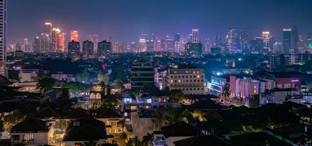 Jakarta business district skyline at night, Indonesia investment landscape